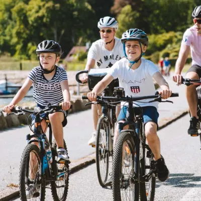 Family cycling by Flensborg Fjord